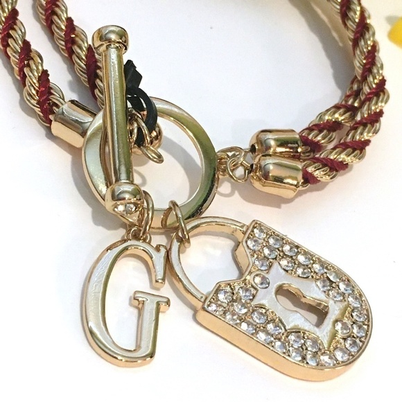 𝅺3/$29! GUESS Twisted Rope Bracelet with Lock - Picture 7 of 9
